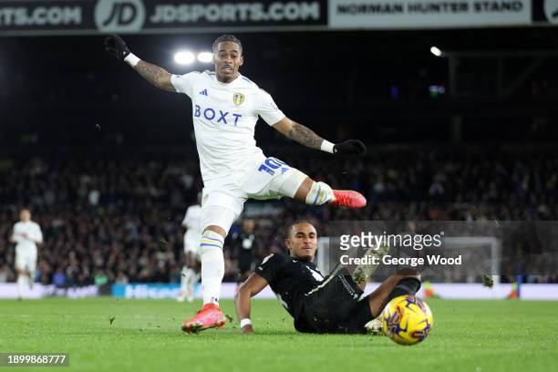 Crysencio Summerville of Leeds United battles for possession with Emanuel Aiwu of Birmingham City during the Sky Bet Championship match between Leeds...