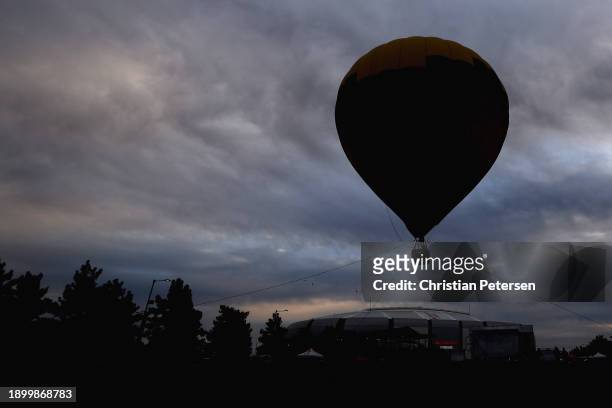 Hot air balloon flys outside of State Farm Stadium before the Fiesta Bowl between the Liberty Flames and the Oregon Ducks on January 01, 2024 in...