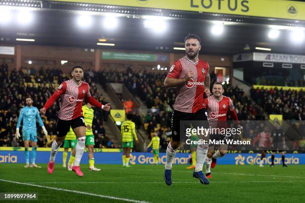 Adam Armstrong of Southampton celebrates after opening the scoring during the Sky Bet Championship match between Norwich City and Southampton FC at...
