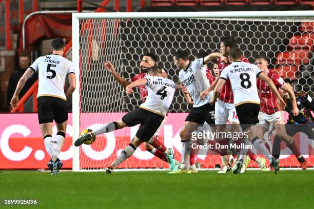Shaun Hutchinson of Millwall scores their team's first goal during the Sky Bet Championship match between Bristol City and Millwall at Ashton Gate on...