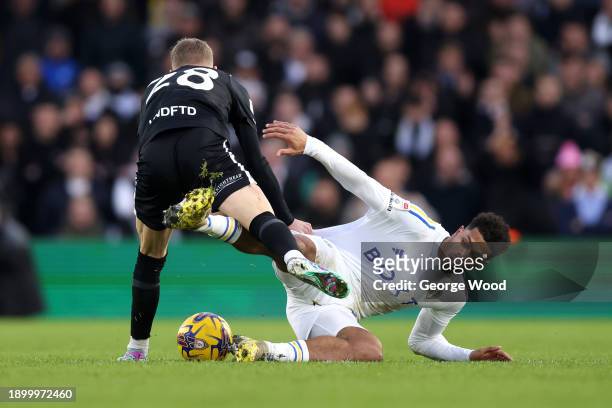 Georginio Rutter of Leeds United battles for possession with Jay Stansfield of Birmingham City during the Sky Bet Championship match between Leeds...