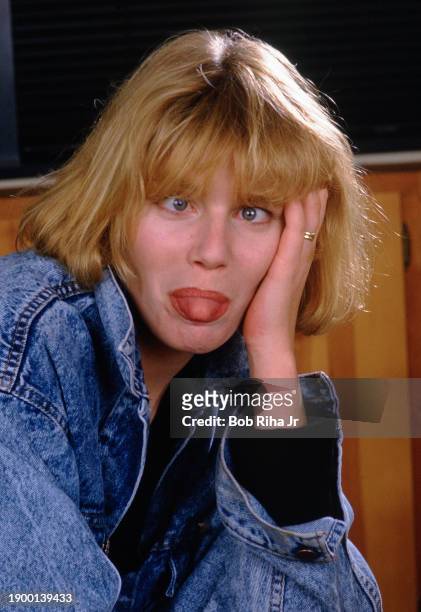 Actress Kelly McGillis having fun during photo session, circa. June 1,1987 in Los Angeles, California.