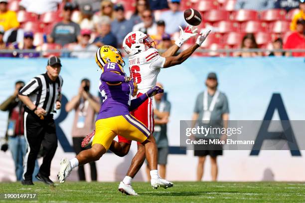 Vinny Anthony II of the Wisconsin Badgers makes a catch during the ReliaQuest Bowl against the LSU Tigers at Raymond James Stadium on January 01,...