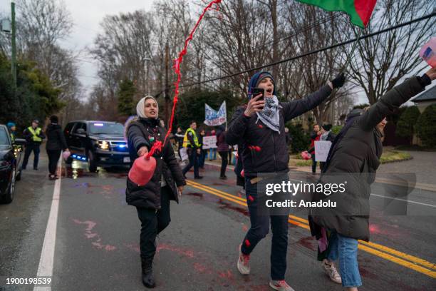 Group of pro-Palestine activists staged protest in front of the US Secretary of State Antony Blinken's House in McLean, VA and spell fake blood on...