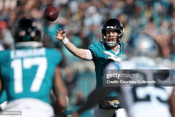 Beathard of the Jacksonville Jaguars throws a pass during the first half of a game against the Carolina Panthers at EverBank Stadium on December 31,...