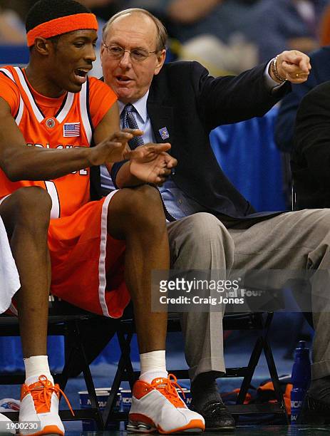 Head coach Jim Boeheim of Syracuse talks things over with Hakim Warrick during the semifinal round of the NCAA Final Four Tournament against Texas on...