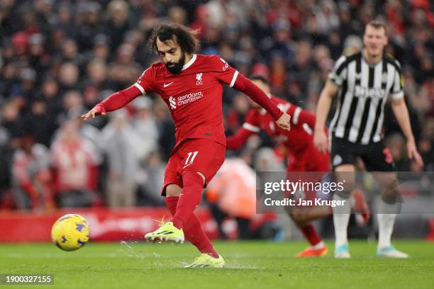 Mohamed Salah of Liverpool misses their sides penalty during the Premier League match between Liverpool FC and Newcastle United at Anfield on January...