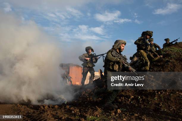 Israeli reserve combat soldiers of the Alexandroni brigade during a training exercise simulating operational scenarios on the Lebanese front...