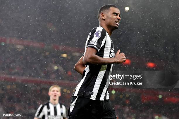 Alexander Isak of Newcastle United celebrates after scoring their sides first goal during the Premier League match between Liverpool FC and Newcastle...