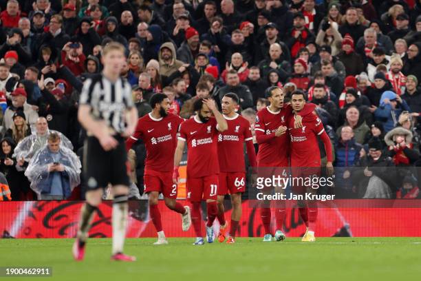 Cody Gakpo of Liverpool celebrates after scoring their sides third goal during the Premier League match between Liverpool FC and Newcastle United at...