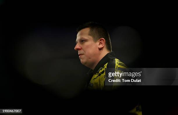 Dave Chisnall of England looks on during his quarter final match against Luke Humphries of England on day 14 of the 2023/24 Paddy Power World Darts...