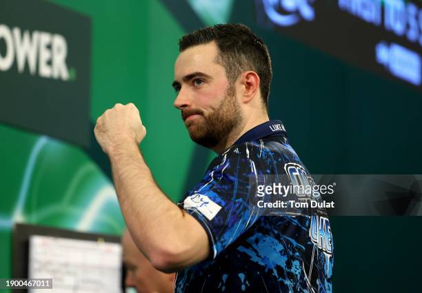 Luke Humphries of England celebrates during his quarter final match against Dave Chisnall of England on day 14 of the 2023/24 Paddy Power World Darts...