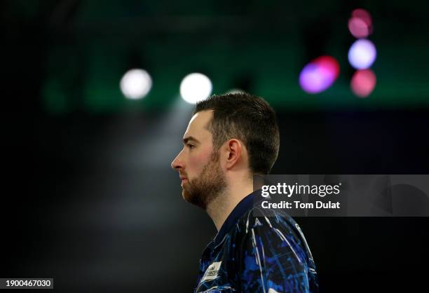 Luke Humphries of England looks on during his quarter final match against Dave Chisnall of England on day 14 of the 2023/24 Paddy Power World Darts...