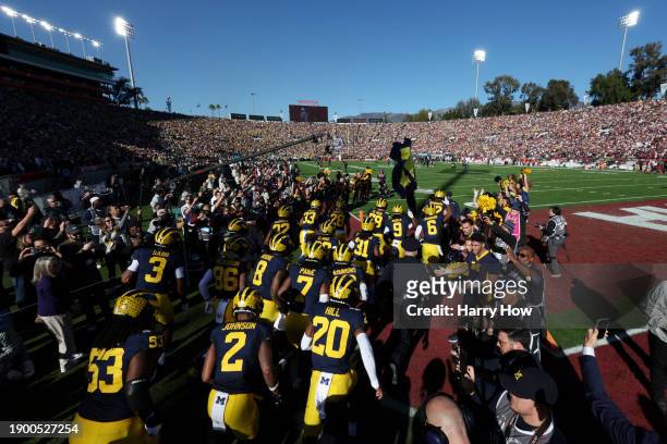 The Michigan Wolverines take the field before the CFP Semifinal Rose Bowl Game against the Alabama Crimson Tide at Rose Bowl Stadium on January 01,...