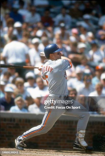 Sean Berry of the Montreal Expos bats against the Chicago Cubs during Major League Baseball game circa 1993 at Wrigley Field in Chicago, Illinois....