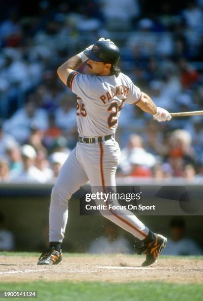 Rafael Palmeiro of the Baltimore Orioles bats against the New York Yankees during a Major League Baseball game circa 1994 at Yankee Stadium in the...