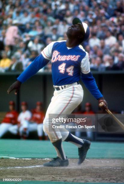 Hank Aaron of Atlanta Braves bats against the Cincinnati Reds during a Major League Baseball game circa 1974 at Riverfront Stadium in Cincinnati,...