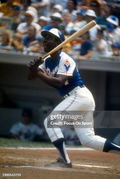 Hank Aaron of Atlanta Braves bats against the New York Mets during a Major League Baseball game circa 1974 at Shea Stadium in the Queens borough of...