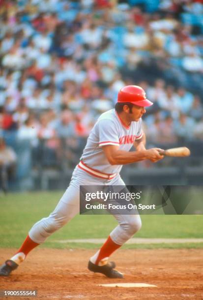 Johnny Bench of the Cincinnati Reds bunts against the Atlanta Braves during a Major League Baseball game circa 1982 at Atlanta-Fulton County Stadium...