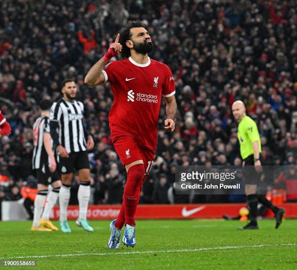 Mohamed Salah of Liverpool celebrates after scoring the fourth Liverpool goal during the Premier League match between Liverpool FC and Newcastle...