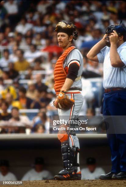 Rick Dempsey of the Baltimore Orioles looks on from his position against the New York Yankees during an Major League Baseball game circa 1982 at...