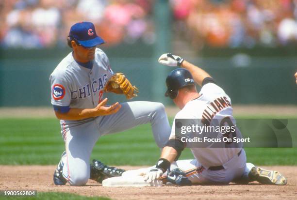 Ryne Sandberg of the Chicago Cubs gets the put out at second base on Matt Williams of the San Francisco Giants during a Major League Baseball game...