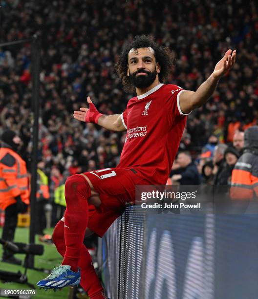 Mohamed Salah of Liverpool celebrates after scoring the fourth Liverpool goal during the Premier League match between Liverpool FC and Newcastle...