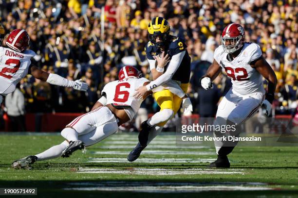 McCarthy of the Michigan Wolverines runs with the ball while being chased by Jaylen Key of the Alabama Crimson Tide in the first quarter during the...