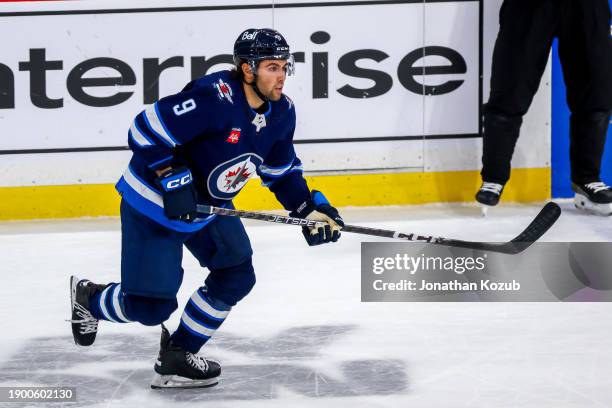 Alex Iafallo of the Winnipeg Jets skates during third period action against the Minnesota Wild at Canada Life Centre on December 30, 2023 in...