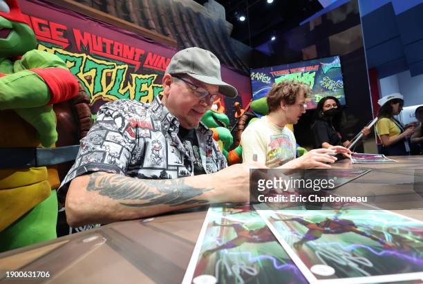 Co-Creator Kevin Eastman and Director Jeff Rowe at the Paramount Pictures and Nickelodeon Movies Teenage Mutant Ninja Turtles: Mutant Mayhem Booth...