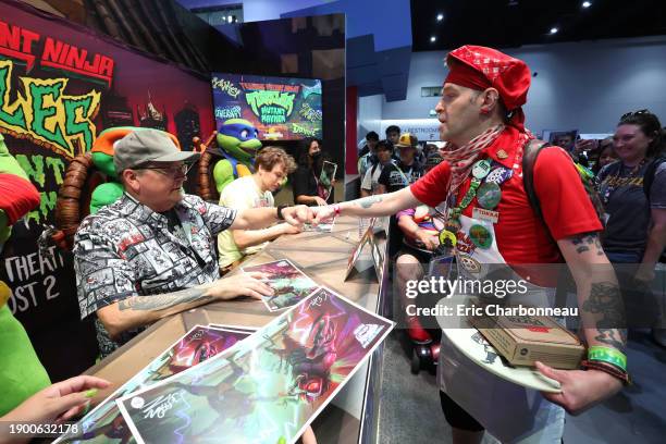 Co-Creator Kevin Eastman and Director Jeff Rowe at the Paramount Pictures and Nickelodeon Movies Teenage Mutant Ninja Turtles: Mutant Mayhem Booth...