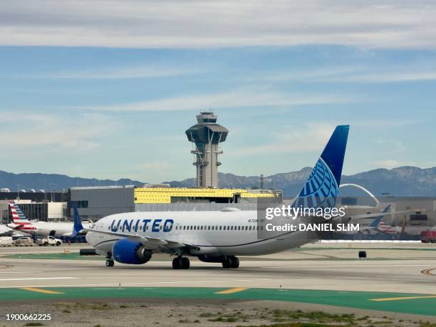 An United airlines plane taxis at Los Angeles International Airport in Los Angeles, California on January 4, 2024.