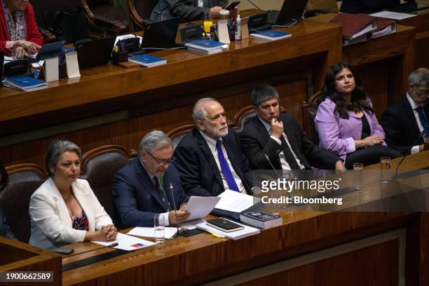 Jeannette Jara, Chiles labor and social security minister, from left, Pablo Ruiz Tagle, lawyer of Carlos Montes, Carlos Montes, Chiles housing...