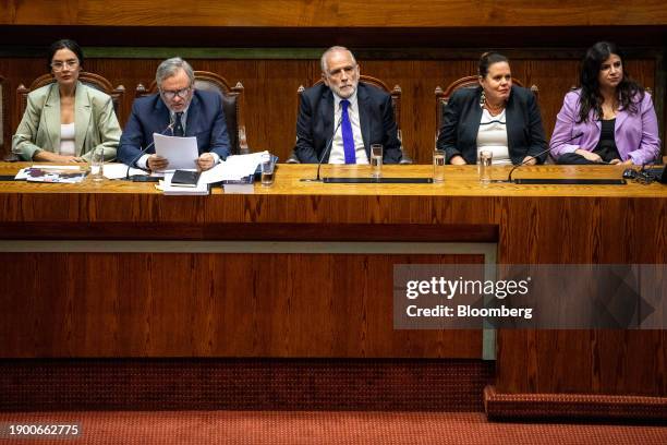 Camila Vallejo, Chile's secretary general of government minister, from left, Pablo Ruiz Tagle, lawyer of Carlos Montes, Carlos Montes, Chile's...