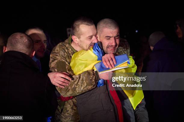 Ukrainian soldiers and civilians are released and reunite with their families as a part of Russia-Ukraine prisoner exchange, on January 03, 2024 in...