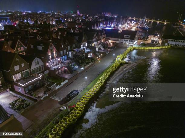 An aerial view from Volendam as the village places sandbags along the body of water as a measure to face the floods in Volendam, Netherlands on...