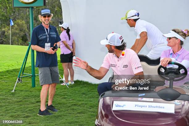 Actor Owen Wilson greets Max Homa and Rickie Fowler during the first round of The Sentry on The Plantation Course at Kapalua on January 4, 2024 in...