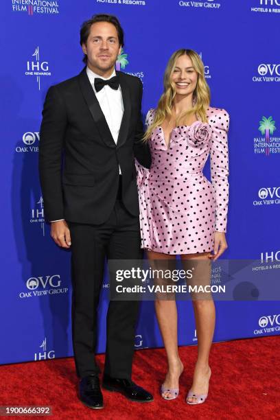 Australian actress Margot Robbie and husband British producer Tom Ackerley arrive for the 35th Annual Palm Springs International Film Festival Awards...