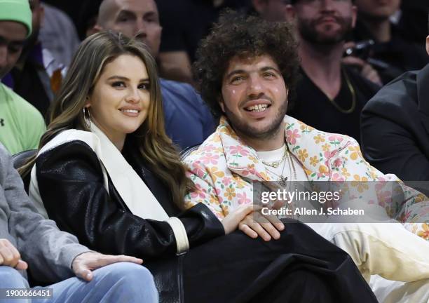 Los Angeles, CA Actress Selena Gomez, left, and actor Benny Blanco during the first half of an NBA basketball game between the Los Angeles Lakers at...