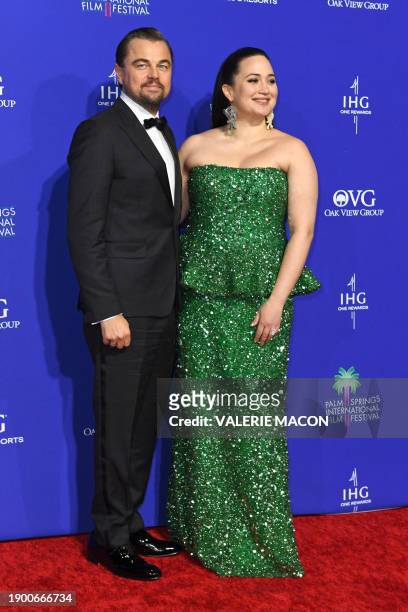 Actor Leonardo DiCaprio and US actress Lily Gladstone arrive for the 35th Annual Palm Springs International Film Festival Awards Gala at the...