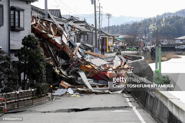 Debris blocks a road in the city of Wajima, Ishikawa prefecture, on January 5 after a major 7.5 magnitude earthquake struck the Noto region on New...