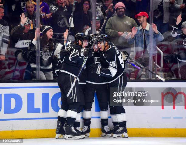 Matt Roy of the Los Angeles Kings celebrates his goal with teammates during the first period against the Detroit Red Wings at Crypto.com Arena on...