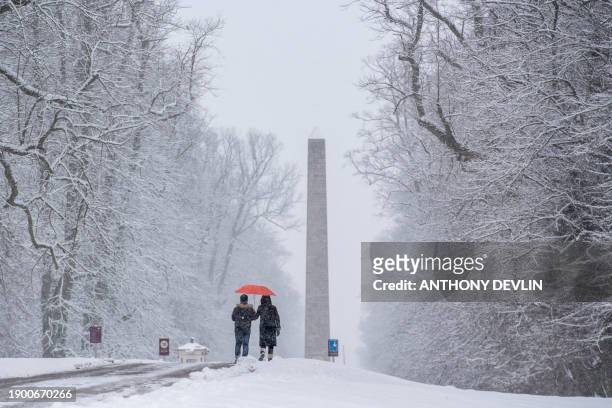 Tourists visit Haworth Castle in Haworth as snow blankets northern England on February 27, 2018. A blast of Siberian weather dubbed "The Beast from...
