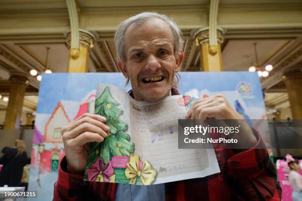 Dozens of girls and boys are taking photos in the facilities of the Postal Palace in the Zocalo of Mexico City, delivering letters to the Three Wise...