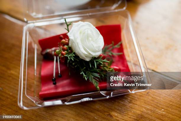 rose and yew boutonniere - yew tree stock pictures, royalty-free photos & images