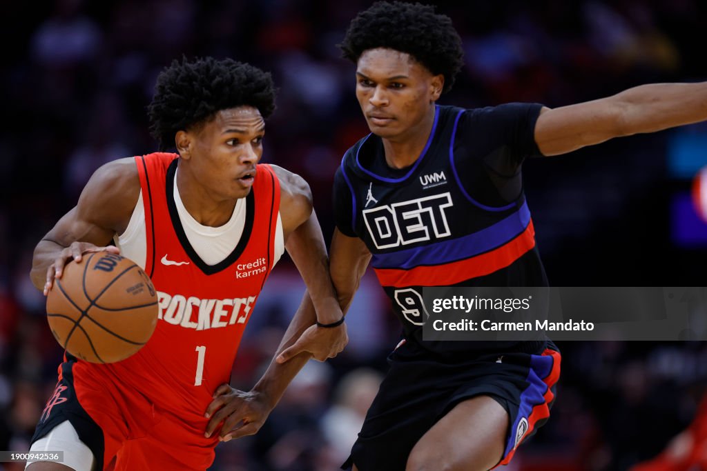 Houston Rockets Thompson Amen Thompson of the Houston Rockets drives against Ausar Thompson of ...