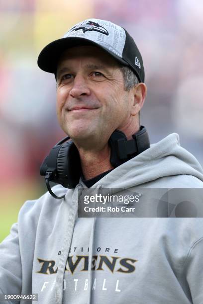 Head coach John Harbaugh of the Baltimore Ravens looks on before the start of the Ravens and Miami Dolphins game at M&T Bank Stadium on December 31,...