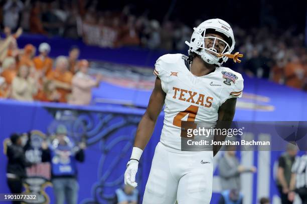 Baxter of the Texas Longhorns celebrates after a touchdown during the second quarter against the Washington Huskies during the CFP Semifinal Allstate...