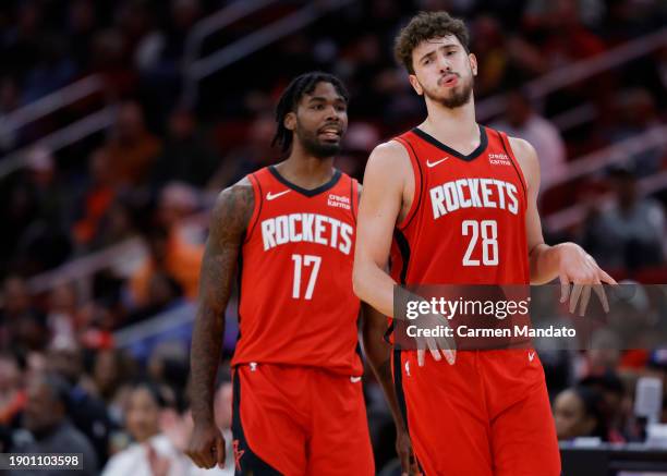 Alperen Sengun of the Houston Rockets reacts to his basket against the Detroit Pistons during the second half at Toyota Center on January 01, 2024 in...