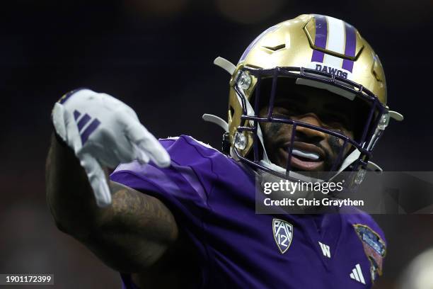 Devin Culp of the Washington Huskies reacts after a touchdown during the third quarter against the Texas Longhorns during the CFP Semifinal Allstate...